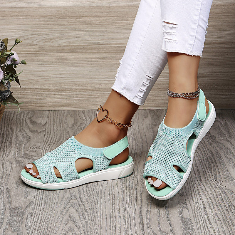 Women's Amiel open-toe slingback sport sandals in light blue knit with a white sporty sole.