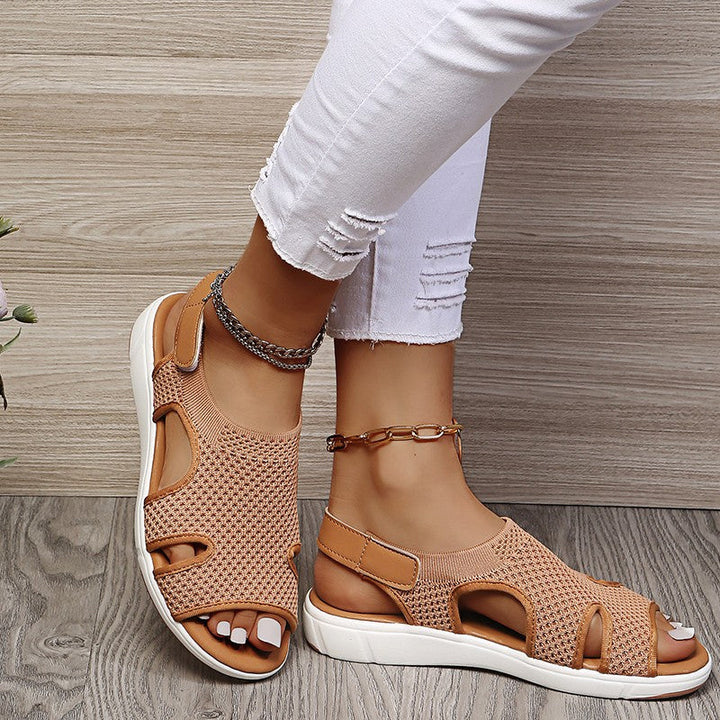Amiel women's open-toe slingback sport sandals in a soft knit-style upper with a sporty flat white sole.