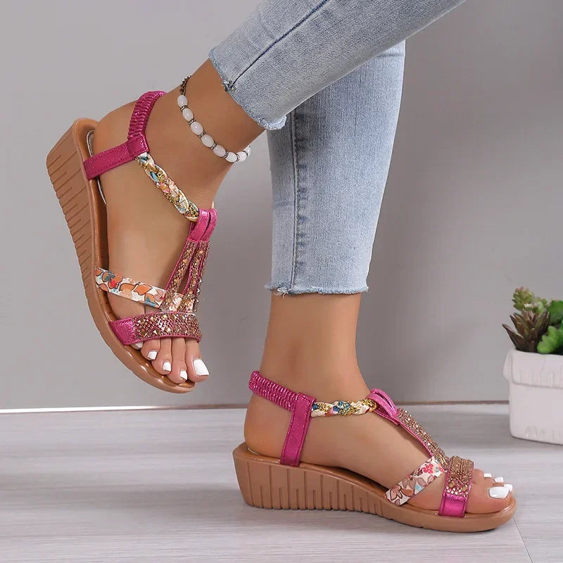 Women's Madeline beaded open-toe wedge sandals in vibrant pink with colorful floral and glitter straps.