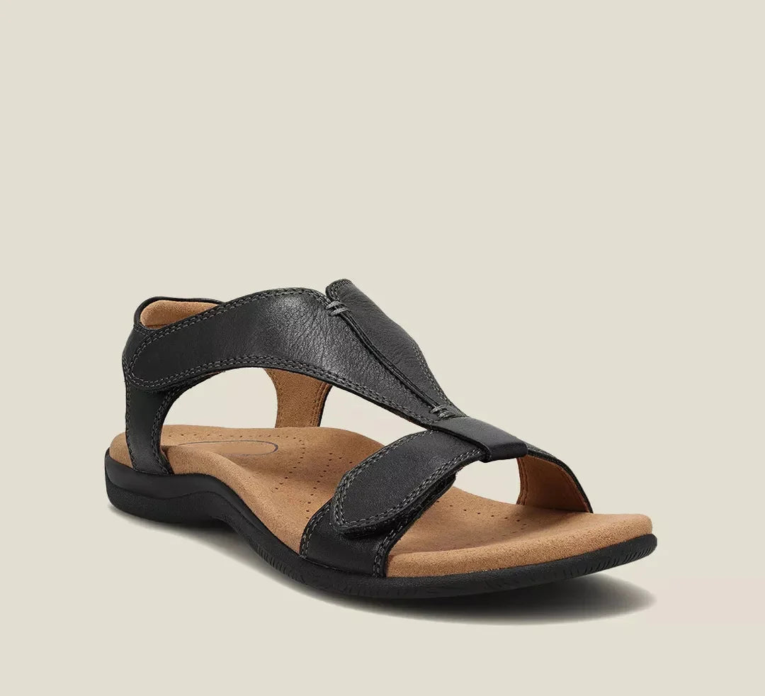 Black Maureen open-toe back strap sandals with adjustable straps and a flat sole for everyday comfort.