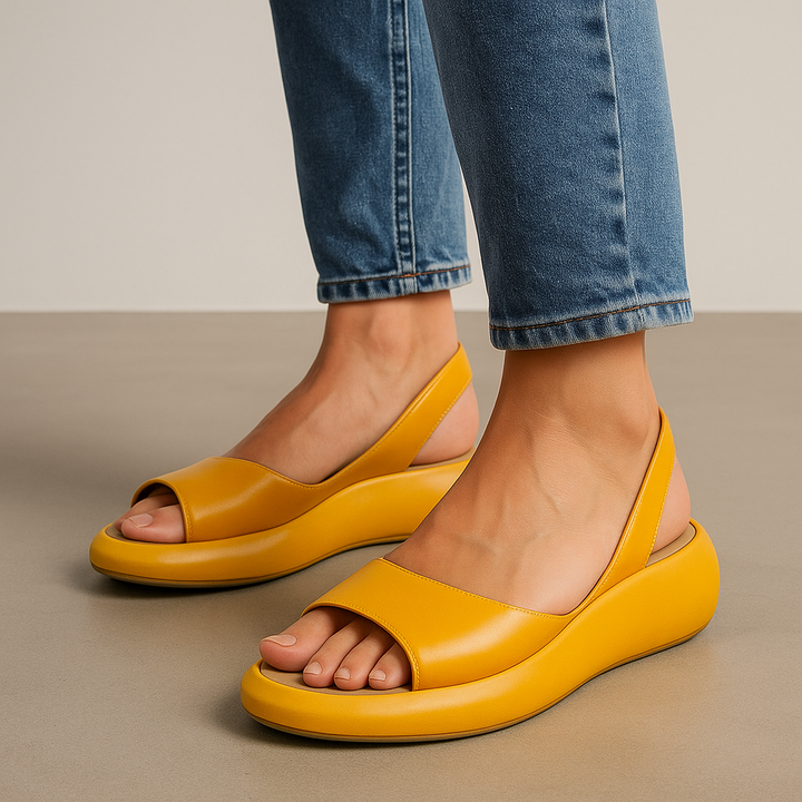 Ottilie women's open-toe slingback sandals in vibrant yellow leather with a low platform sole.