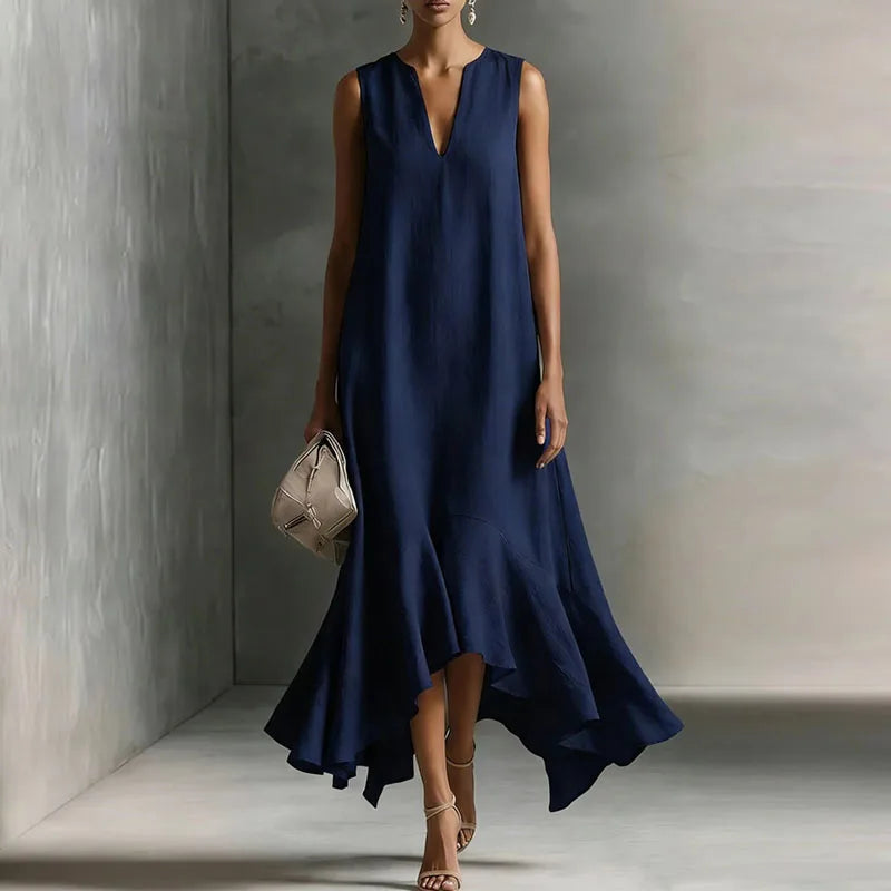 Adeline women's navy V-neck flowy maxi dress with a ruffle hem and natural drape.