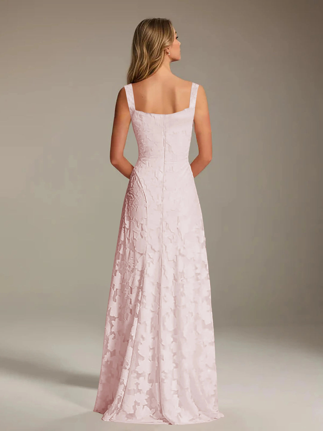 Adrienne A-line floral lace bridesmaid gown in light pink, featuring a square neckline and floor-length skirt.