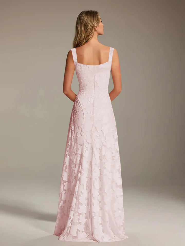 Adrienne A-line floral lace bridesmaid gown in light pink, featuring a square neckline and floor-length skirt.