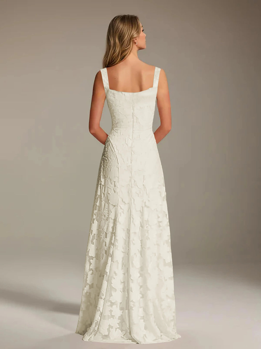 Back view of Adrienne A-line floral lace bridesmaid dress with square neckline.
