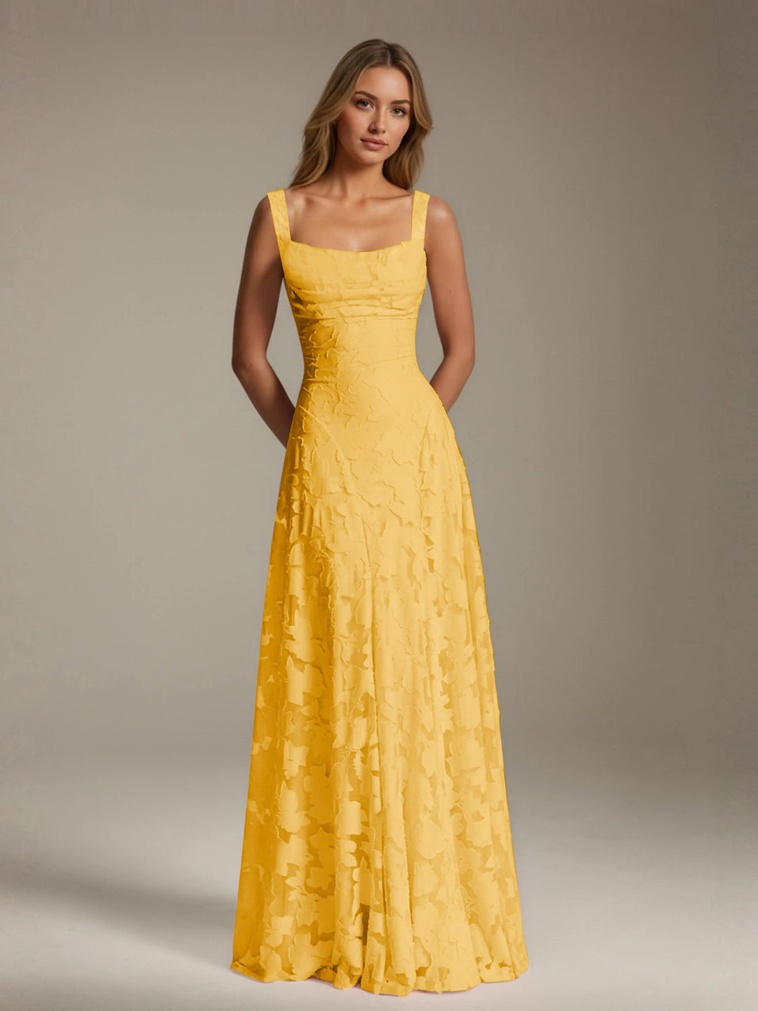 Adrienne women's floral lace A-line gown in yellow with a square neckline.