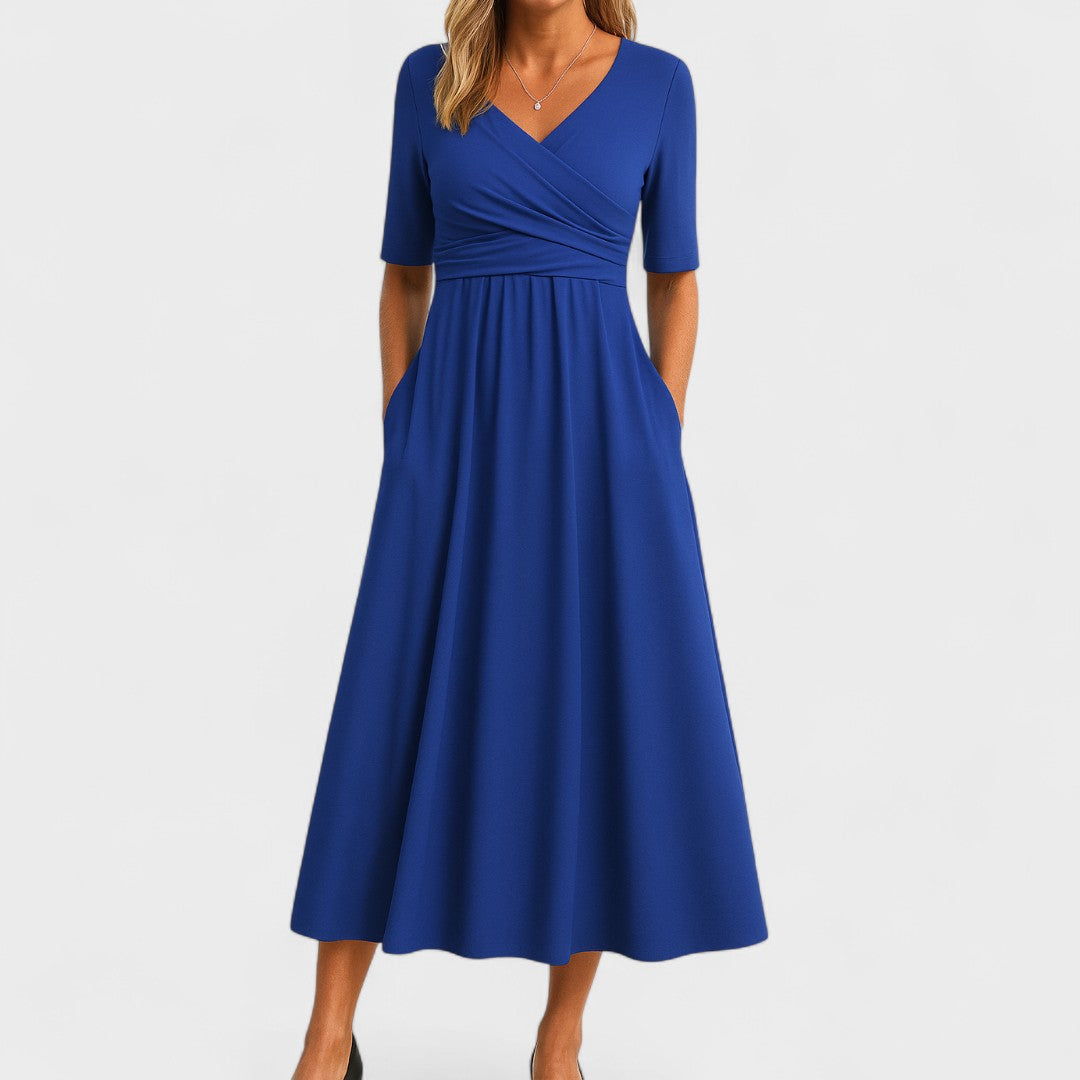 Amaya women's royal blue V-neck wrap-style midi dress with elbow sleeves and side pockets.