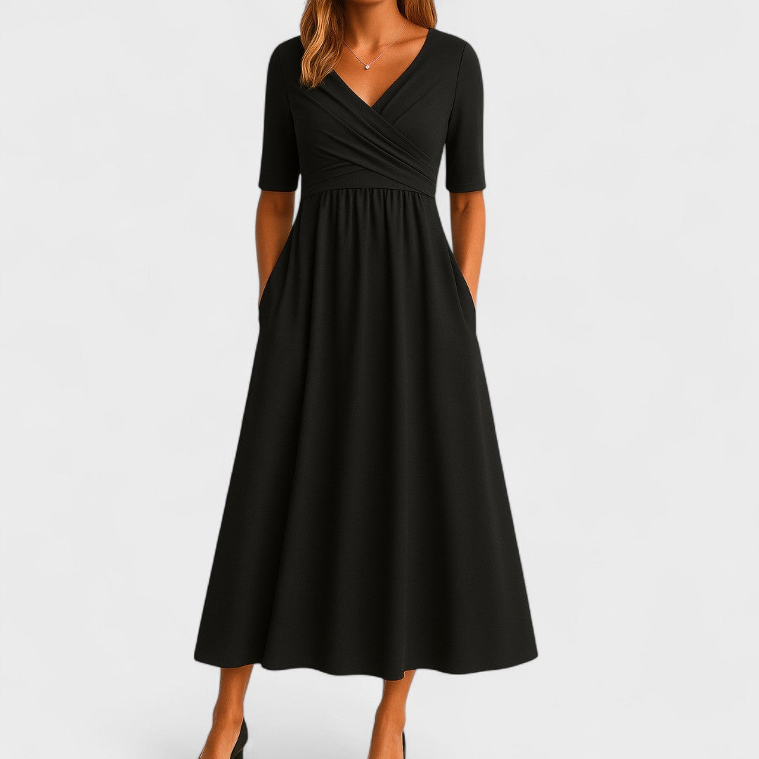 Black V-neck wrap-style midi dress with elbow sleeves and side pockets.