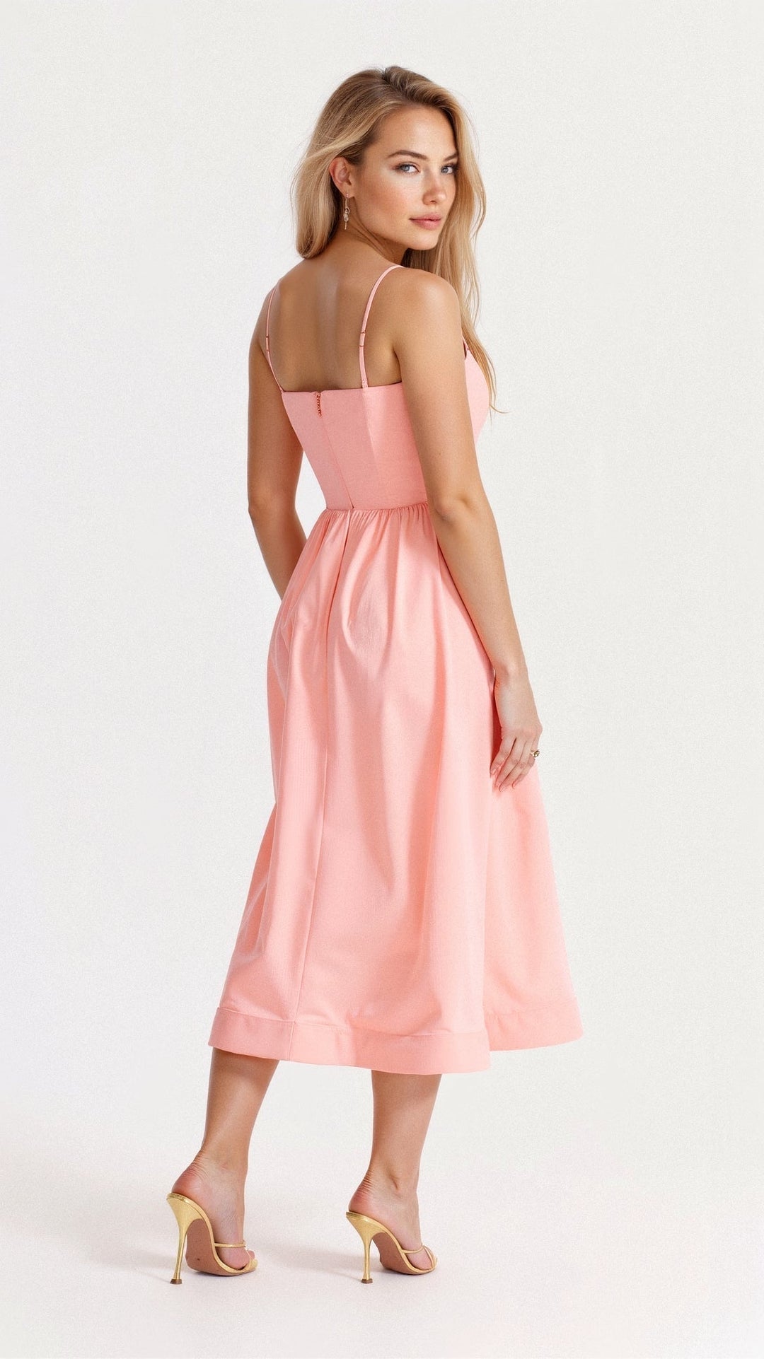 Arabella women's A-line midi dress with spaghetti straps, made from flowing fabric.