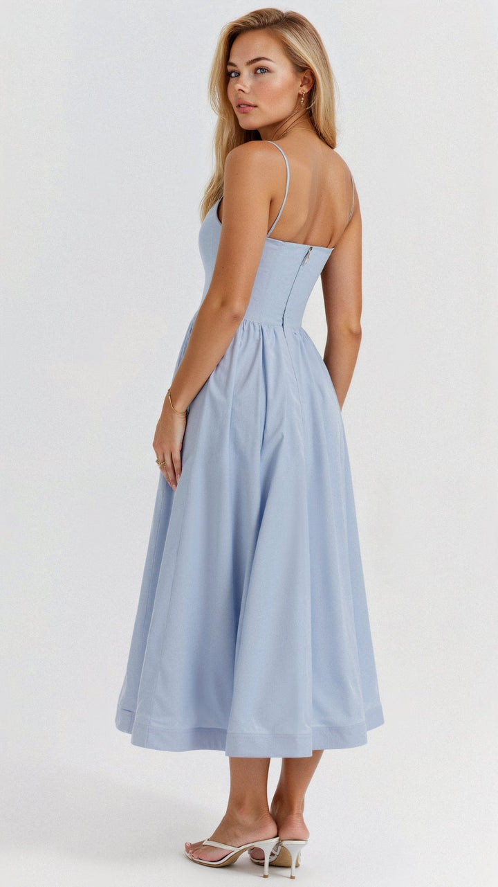 Arabella women's A-line midi dress with spaghetti straps, made from a flowy, solid fabric.