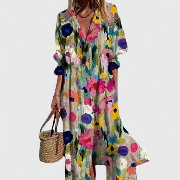Aria Women's Boho Maxi Dress with bold floral print, flowing silhouette, long sleeves, and V-neck.