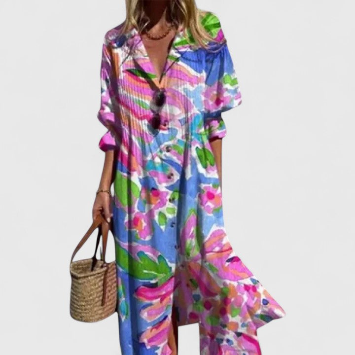 Aria Women's Boho Maxi Dress: Flowing, colorful floral print with long sleeves and button-front closure.