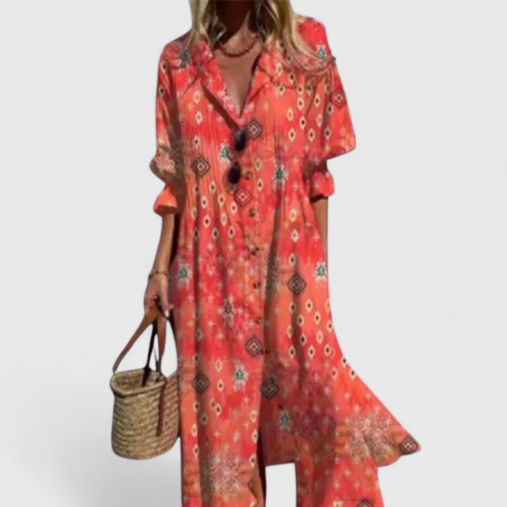 Aria Women's Boho Maxi Dress: Flowing red and orange printed maxi dress with long sleeves, perfect for effortless charm.