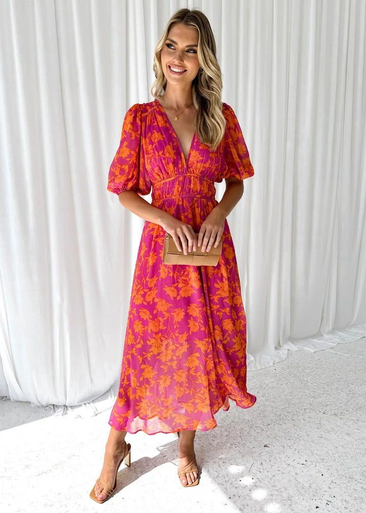 Aria Women's Floral V-Neck Maxi Dress in vibrant pink and orange, featuring short sleeves and a flowing silhouette.