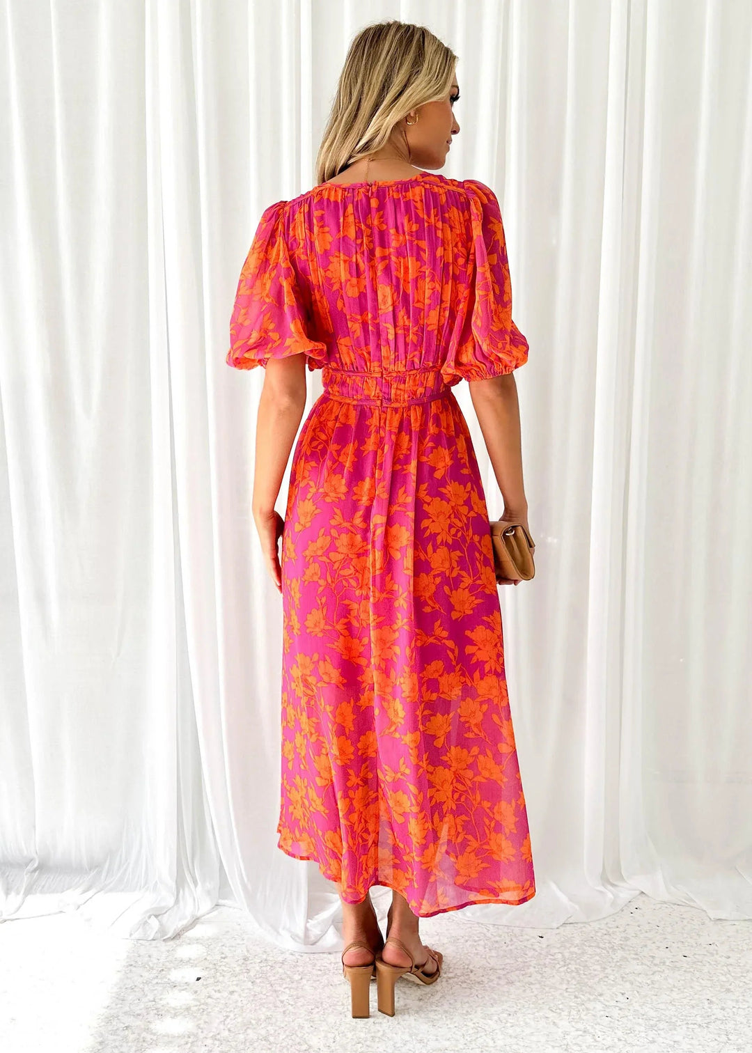 Women's Aria pink floral V-neck maxi dress with short sleeves and flowing silhouette.