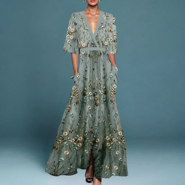 Aurelia Women's Floral Maxi Dress: flowing light gray dress with romantic floral print, V-neck, and pockets.