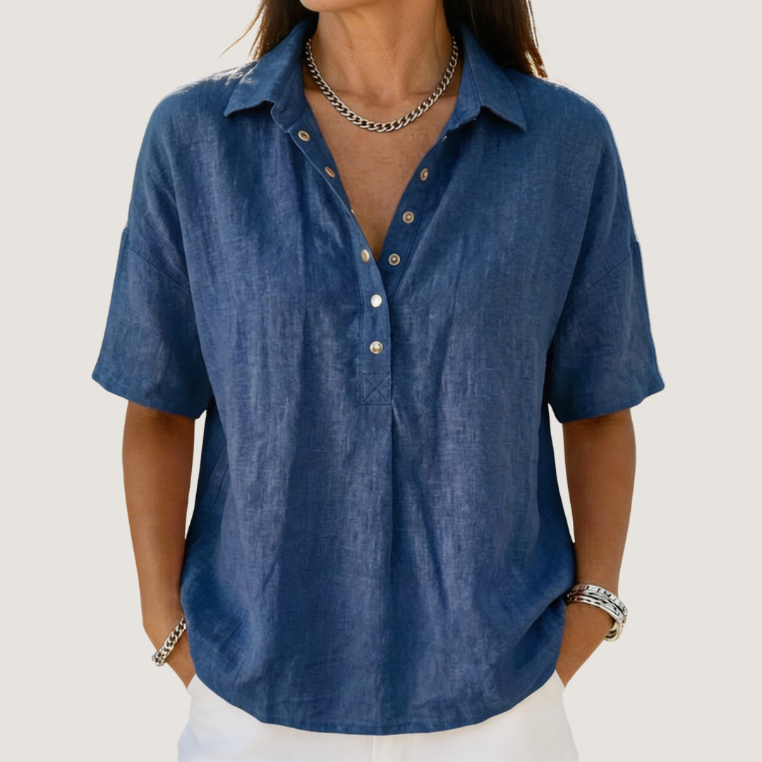 Ava women's collared button-up shirt in breathable blue fabric with a relaxed fit and adjustable neckline.