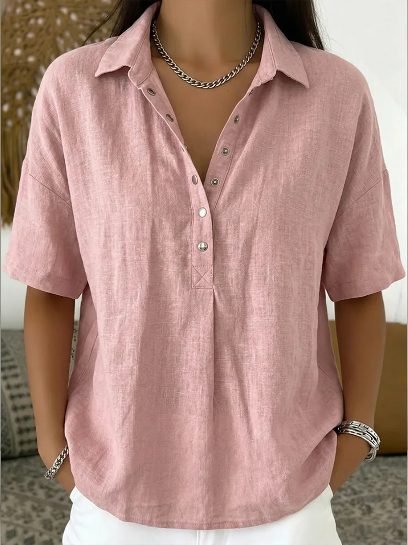 Ava women's collared button-up shirt in soft pink, featuring a relaxed fit and adjustable neckline.