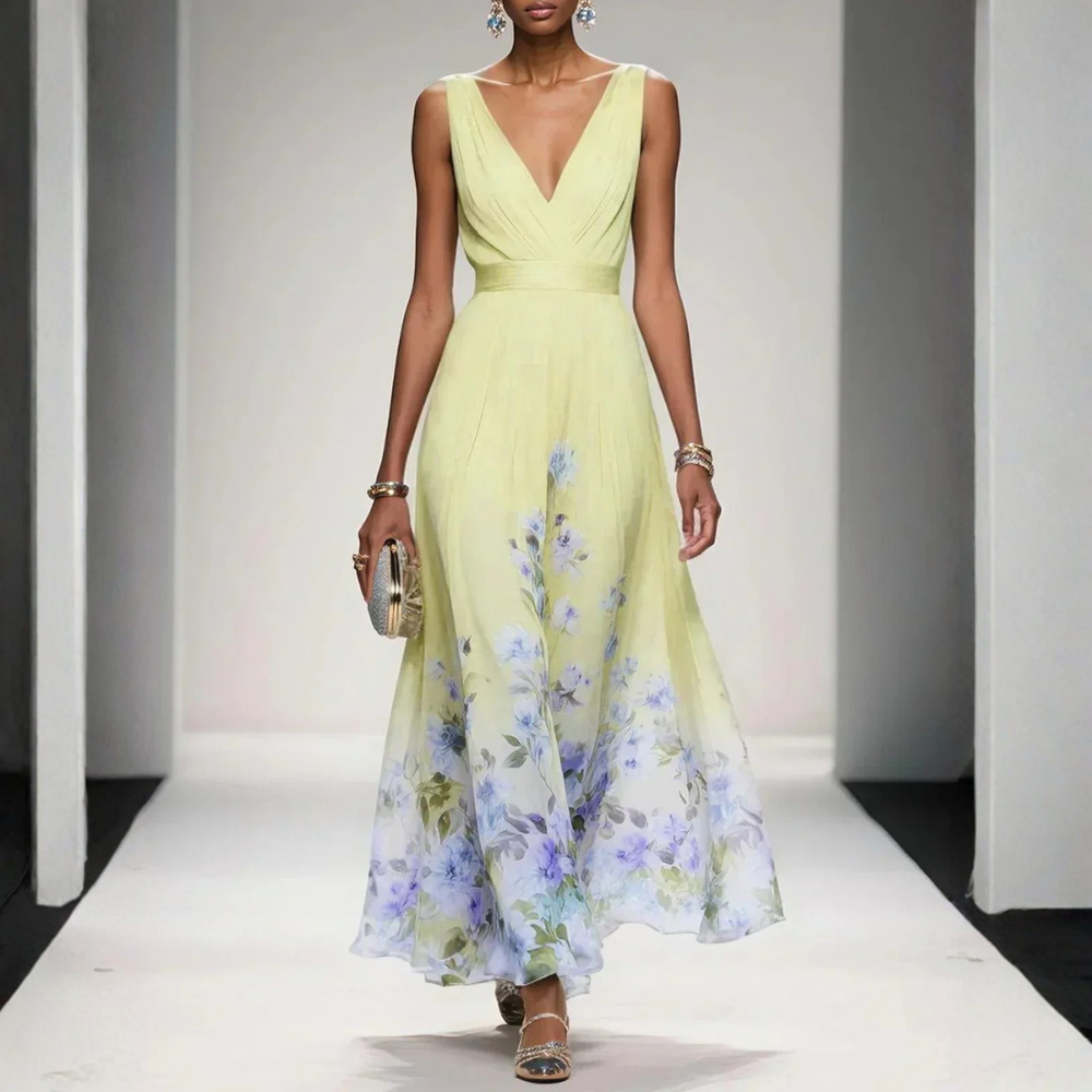Britta women's floral V-neck maxi dress in light yellow with blue and purple flowers.