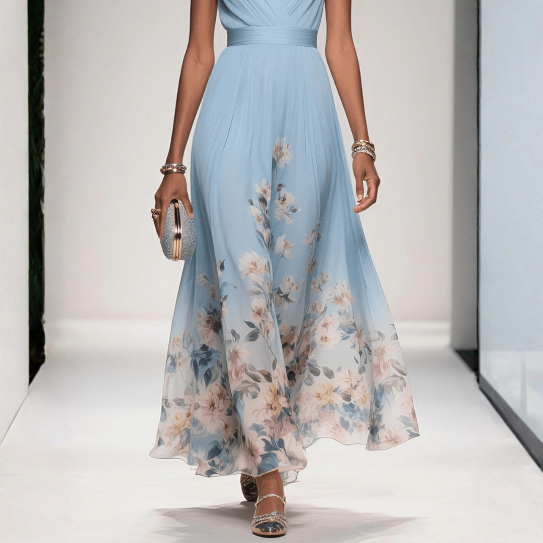 Britta women's light blue floral V-neck maxi dress with flowing skirt and clutch.
