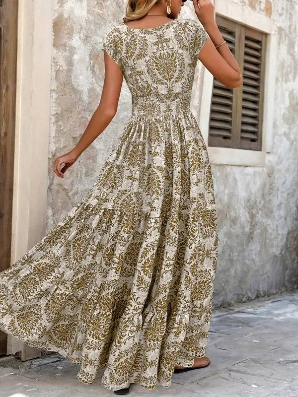Women's Brittany V-neck maxi boho dress with ornate allover print, flutter sleeves, and flowing tiered skirt.