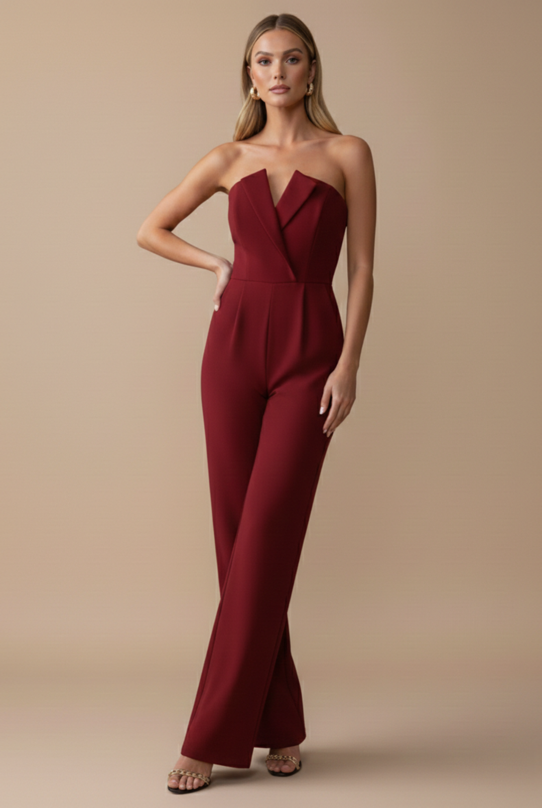 Women's Charlize strapless wide-leg jumpsuit in deep red with a tailored bodice and V-neck detail.