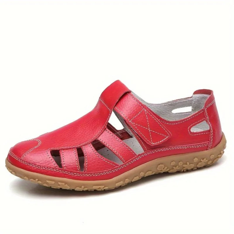Red leather Clara closed-toe fisherman sandals with breathable cutouts and a textured tan sole.