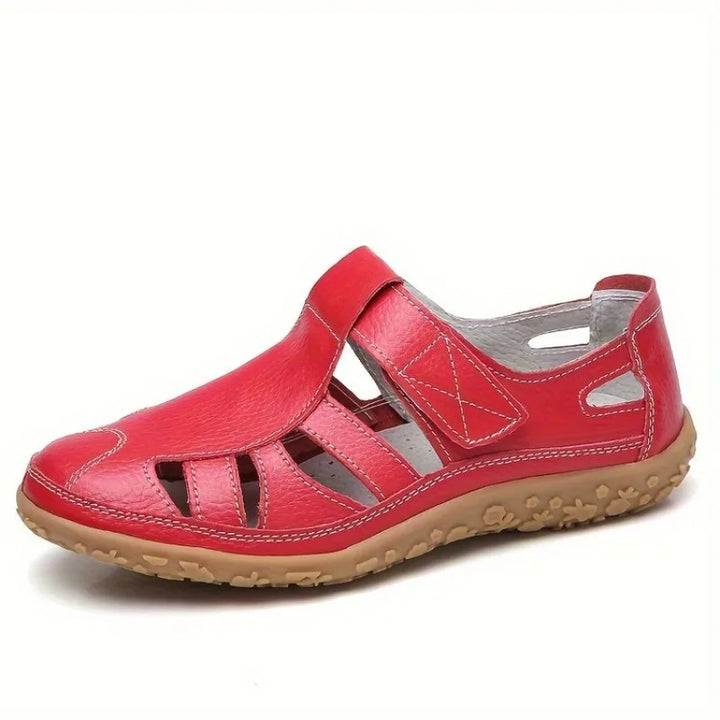 Red leather Clara closed-toe fisherman sandals with breathable cutouts and a textured tan sole.