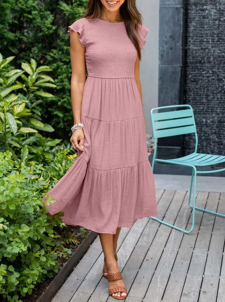 Clara Women's Tiered Cap Sleeve Midi Dress in soft pink, featuring a fitted bodice and flowing tiered skirt.