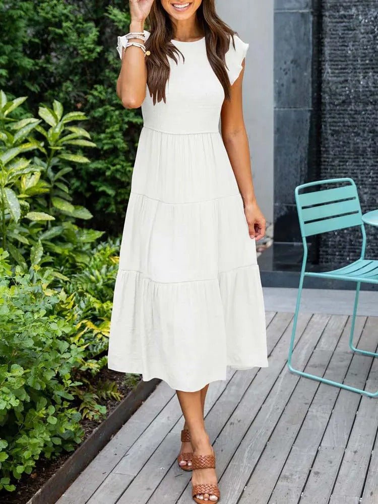 Clara women's white tiered cap sleeve midi dress with a fitted bodice and flowing skirt, perfect for any occasion.