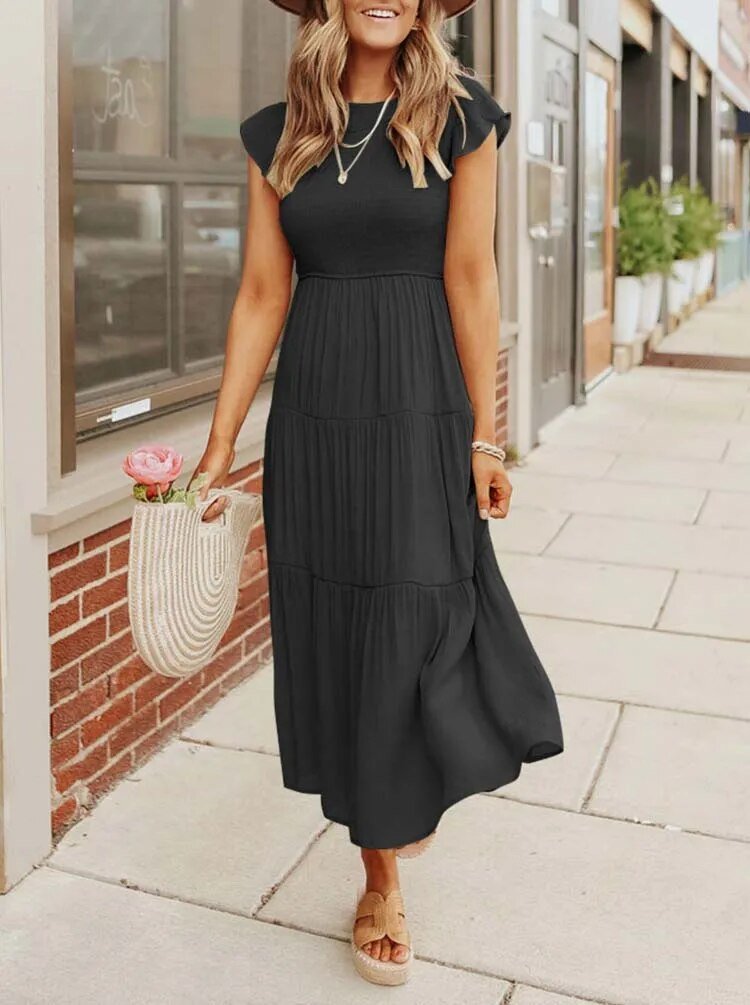 Clara women's black tiered cap sleeve midi dress with a fitted bodice and flowing skirt, perfect for day to evening.
