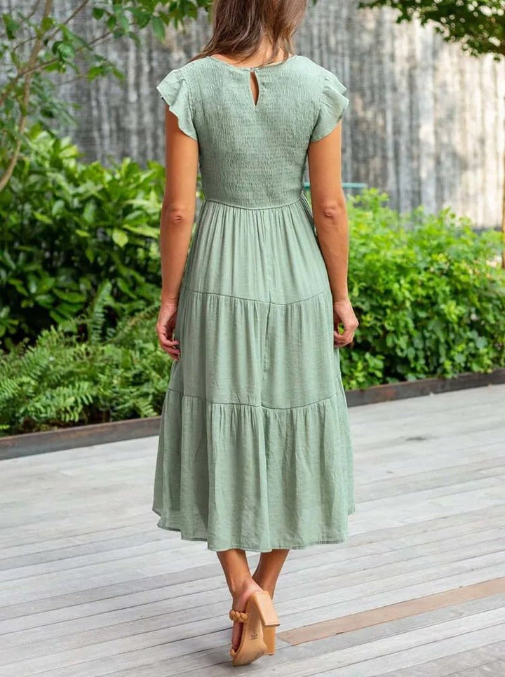Clara Women's Tiered Cap Sleeve Midi Dress in sage green, featuring a fitted bodice and flowing A-line skirt.