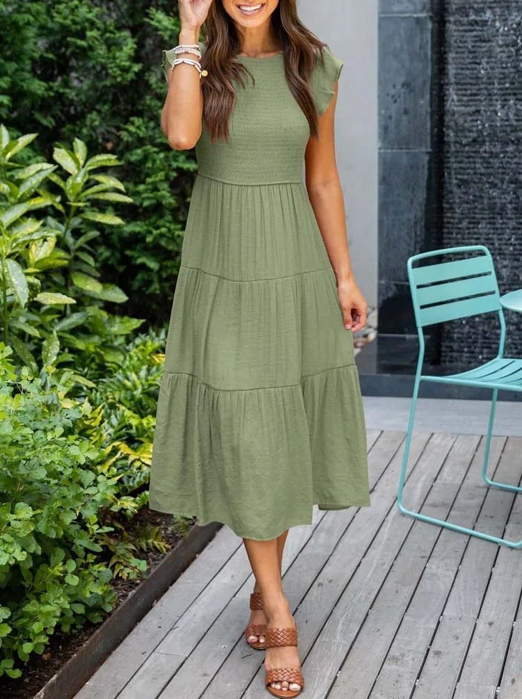 Clara women's tiered cap sleeve midi dress in olive green, featuring a fitted bodice and flowing skirt.