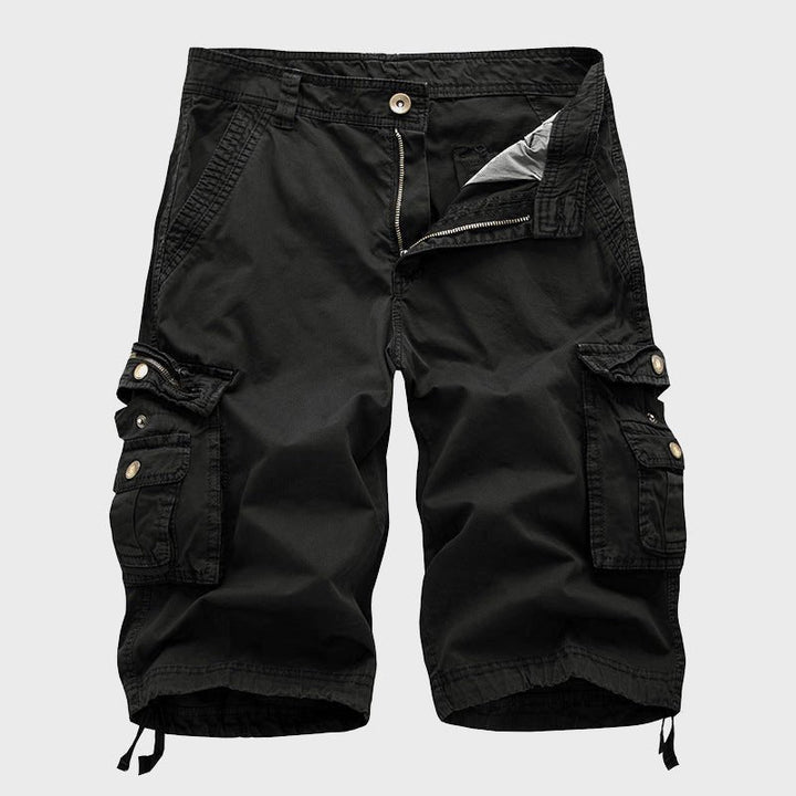 Men's black knee-length Cole cargo shorts with multi-pocket design, zip fly, and adjustable drawstring hems.