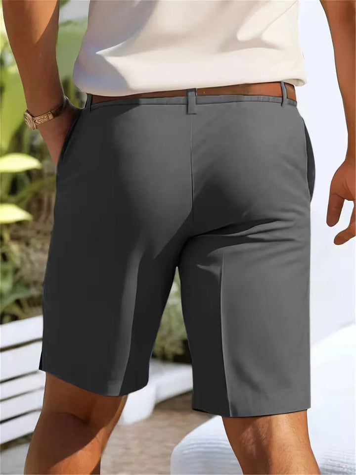 Men's Cole lightweight straight leg shorts in dark gray polyester, featuring a mid-rise waist and belt loops.