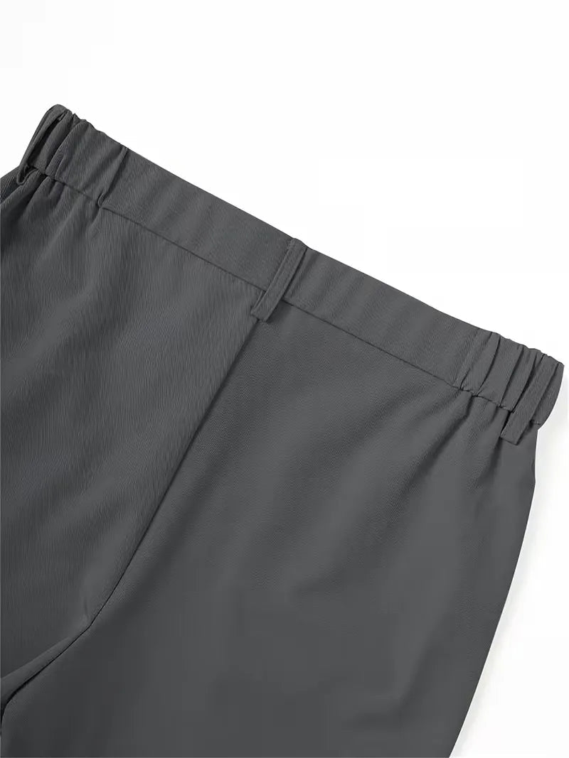 Men's Cole lightweight straight leg shorts in dark gray polyester, featuring a mid-rise waist with belt loops and an elasticized back.