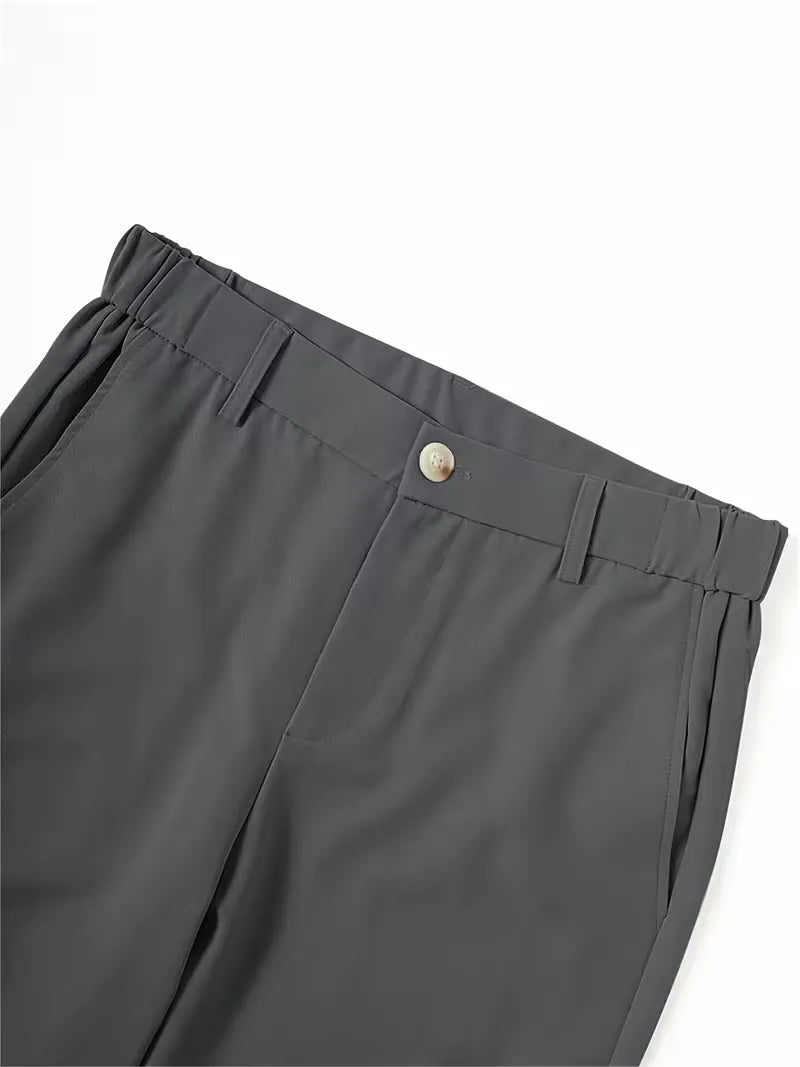 Men's Cole lightweight charcoal gray straight leg shorts with a mid-rise waist, button closure, belt loops, and side pockets.