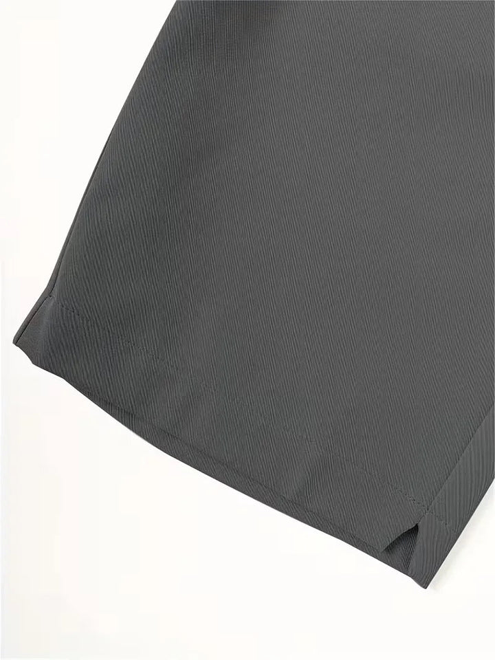 Cole men's lightweight straight leg shorts in dark gray polyester, featuring a clean, relaxed look for warm days.
