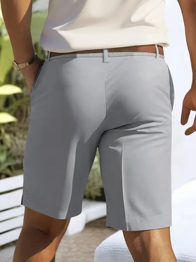 Men's Cole lightweight straight leg shorts in light grey polyester, featuring a brown belt and side pockets.