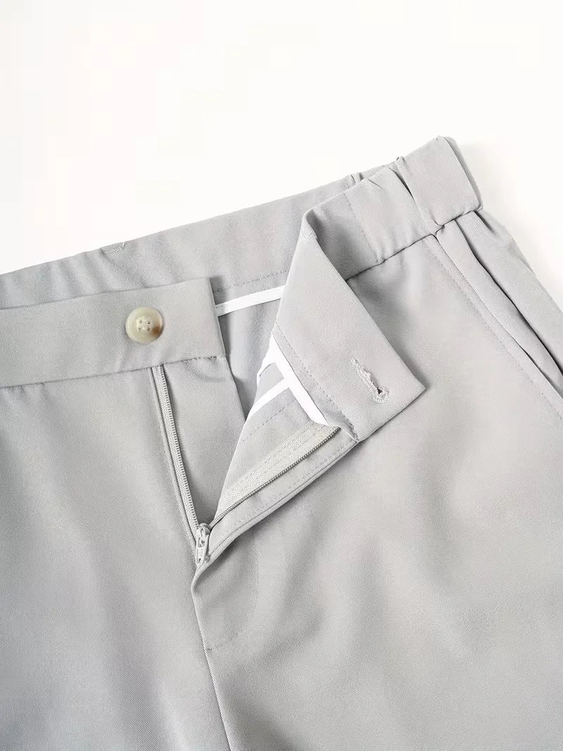 Light gray Cole men's lightweight straight leg shorts, featuring a button, zipper fly, and belt loops.
