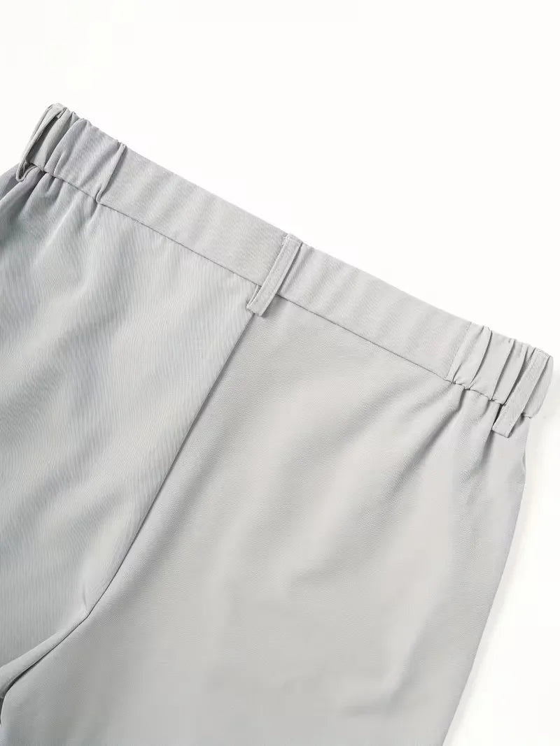 Cole men's lightweight straight leg shorts in light gray polyester, featuring an elasticized waist with belt loops.