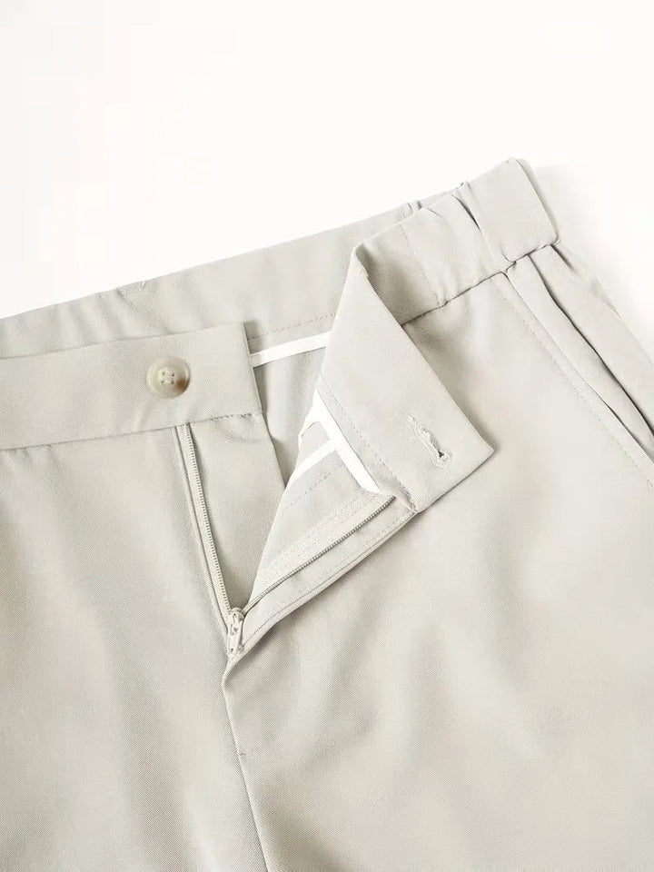 Cole men's lightweight straight leg shorts in light grey, featuring a mid-rise waist, button closure, and zipper fly.