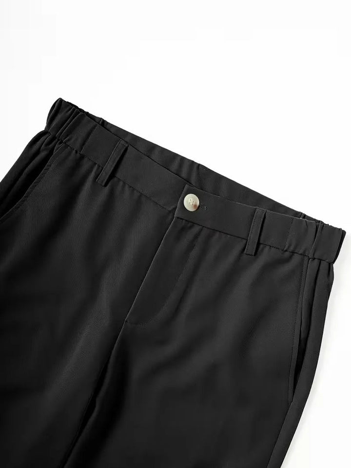 Men's Cole lightweight black straight leg shorts with an elastic waist, button closure, belt loops, and side pockets.