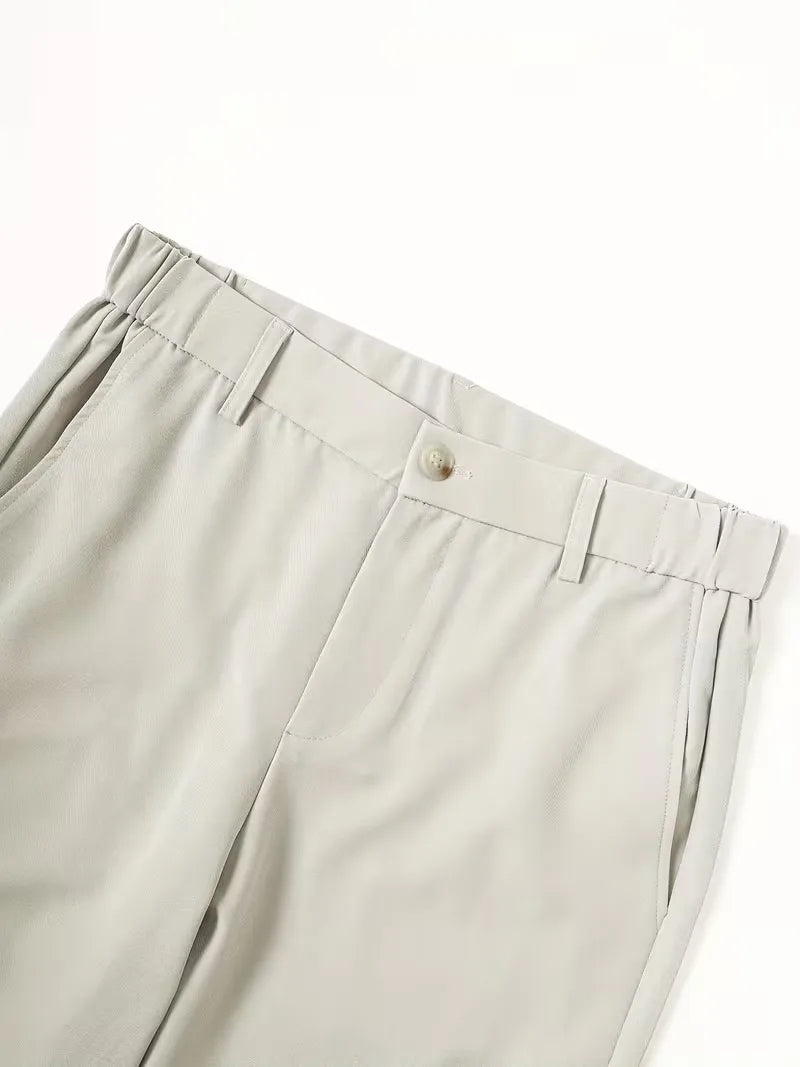 Men's Cole lightweight straight leg shorts in light grey polyester, featuring a mid-rise waist, button closure, belt loops, and side pockets.