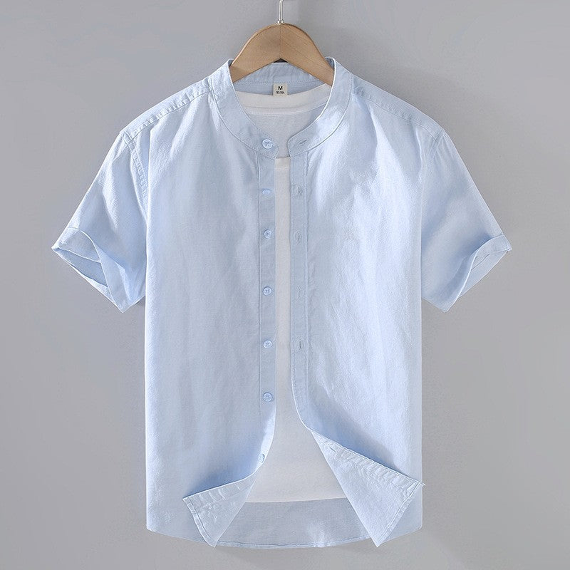 Cole Men's light blue short sleeve linen shirt with a stand collar and full button-front closure.