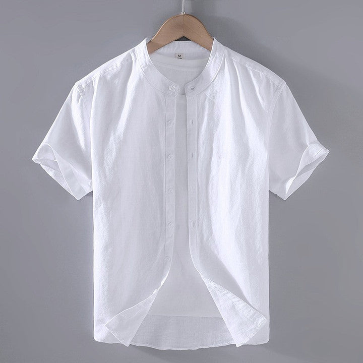 Men's Cole white short-sleeve linen shirt with a stand collar and full button-front closure.