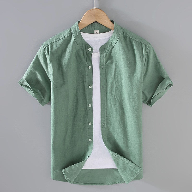 Cole men's short sleeve green linen shirt with a stand collar, full button-front, and textured weave.