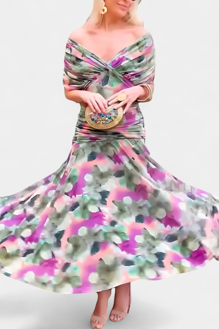 Women's off-shoulder floral maxi dress with a ruched waist, flowing skirt, and vibrant print.