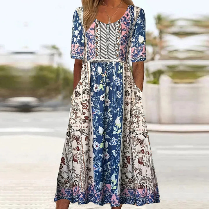 Women's Dahlia square neck boho printed midi dress with blue, pink, and white floral patterns.