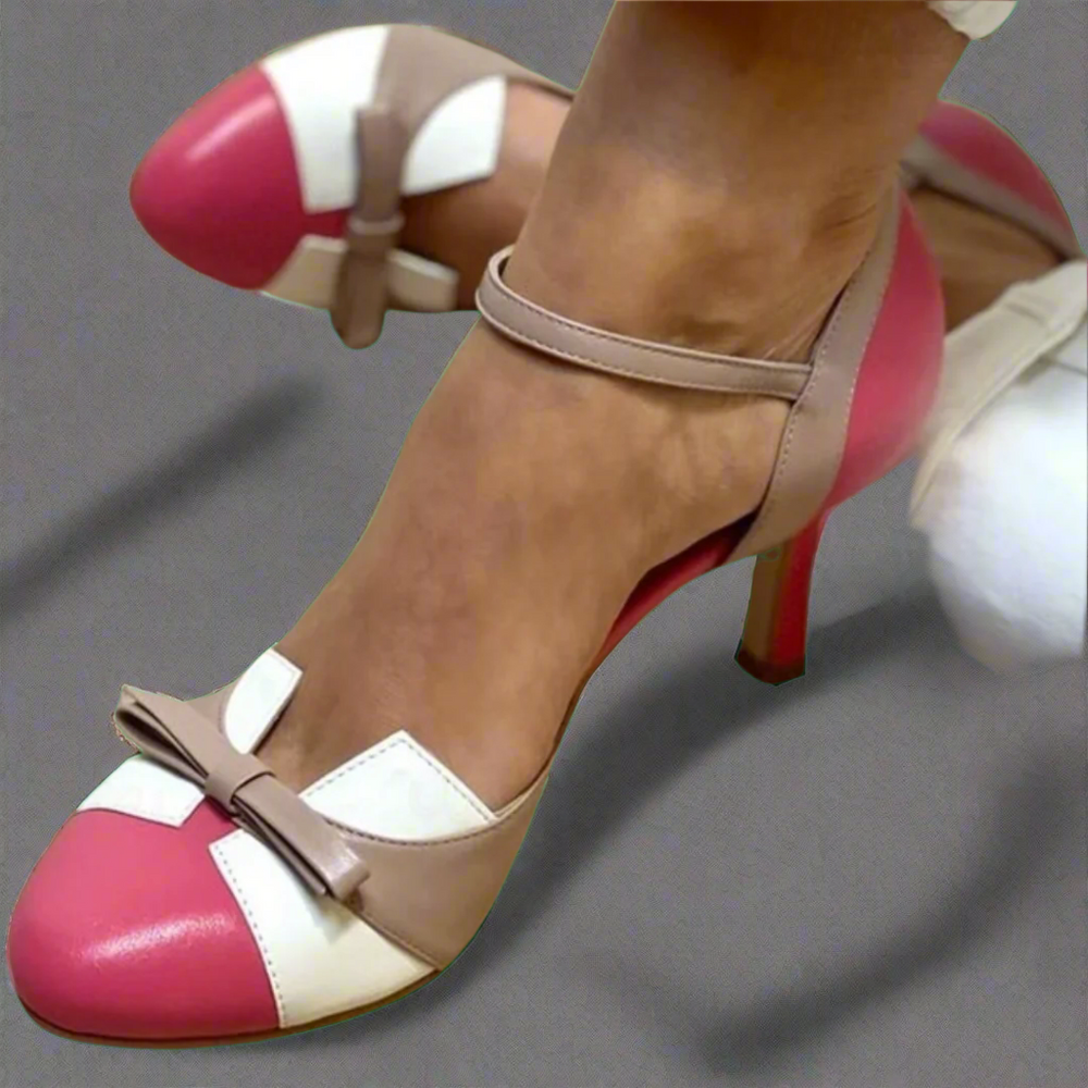 Daphne orthopedic ankle strap heels in a pink, white, and beige colorblock design with a bow accent.